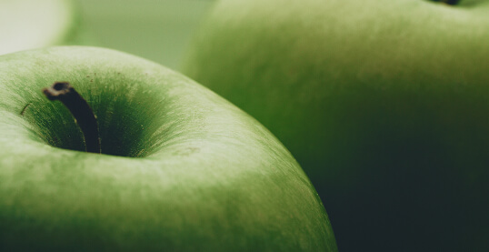 Chemistry Chardonnay green apple close-up image.